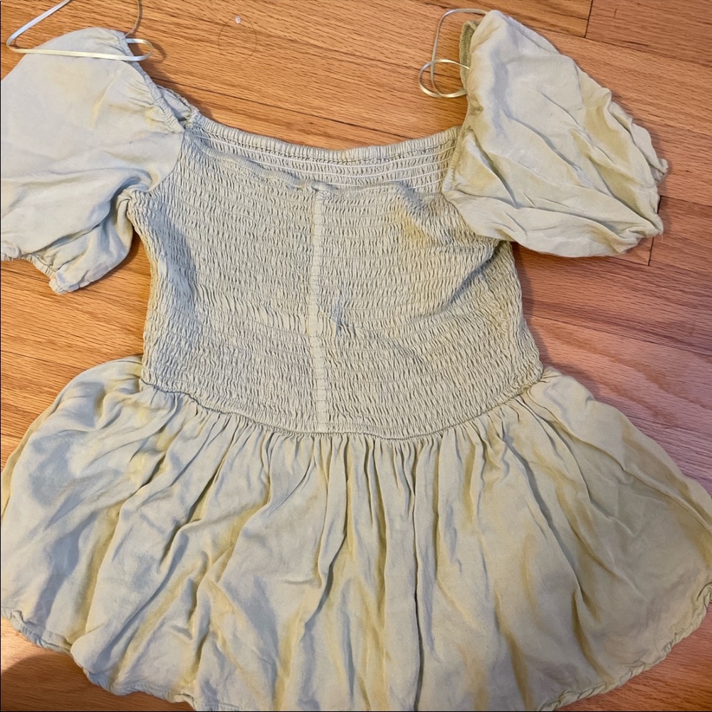 Green baby doll top, medium,  light green, barely worn, from a boutique